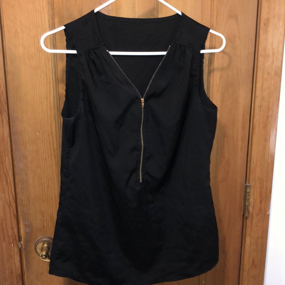 Black half zip up sleeveless shirt